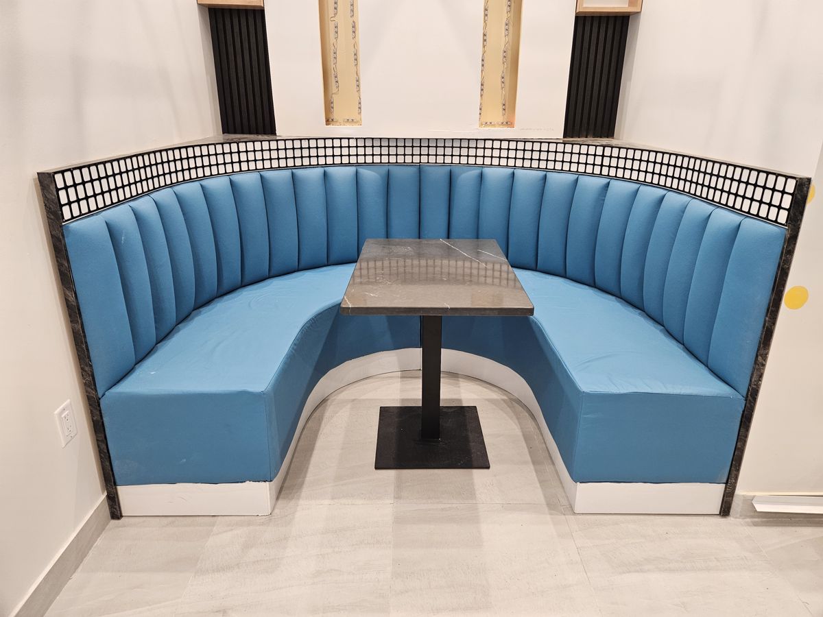 Coffee shop curved blue booth seating