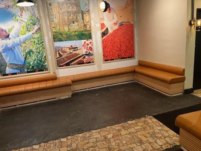 Coffee shop grey channel seating with rust wood trim