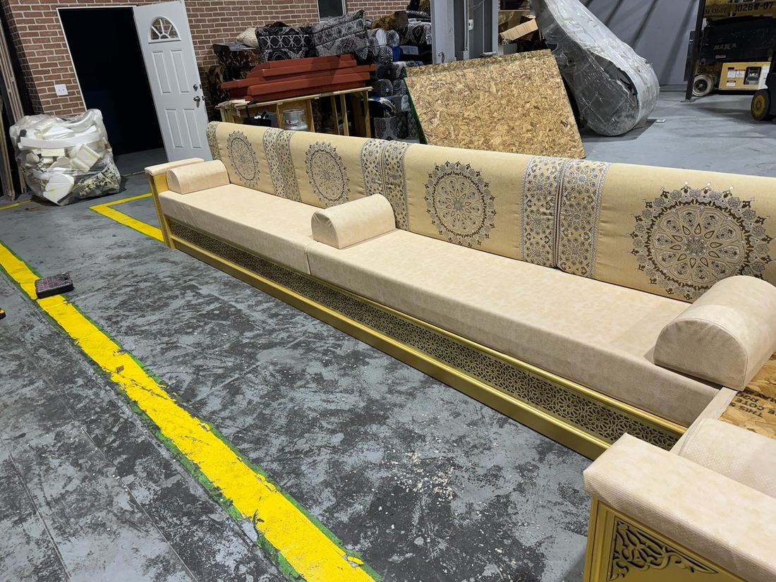 Coffee shop navy blue velvet gold trim seating